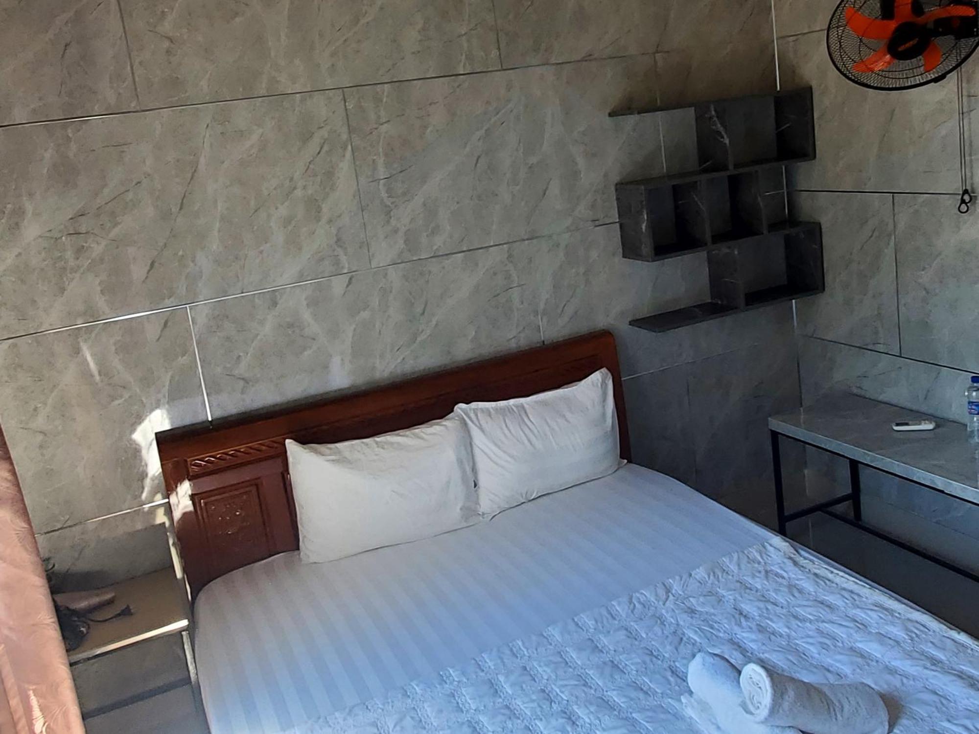 Tuan Thanh Homestay Tân Hiệ Quarto foto